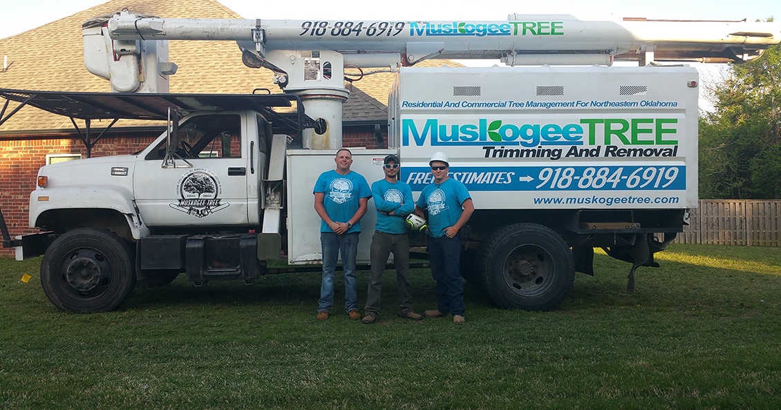 An image of the crew posing in front of our Bucket Truck.